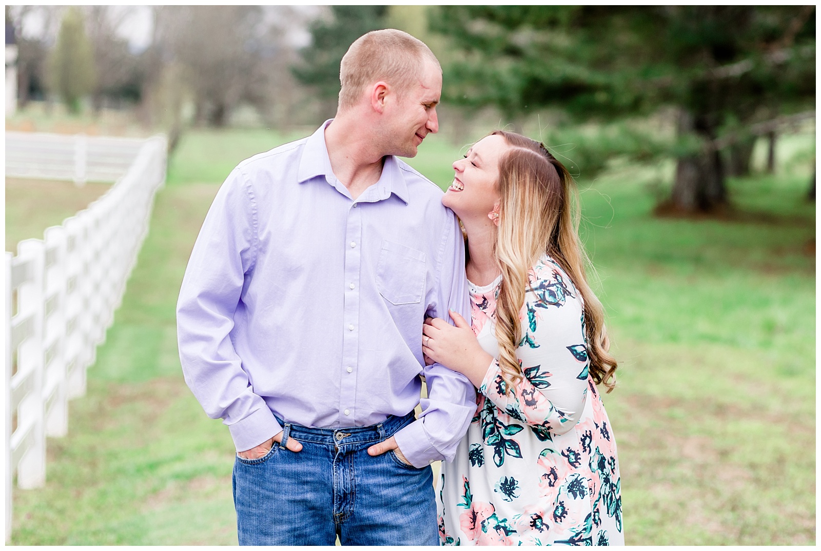Country styled engagement session on farm with floral dress and pastels
