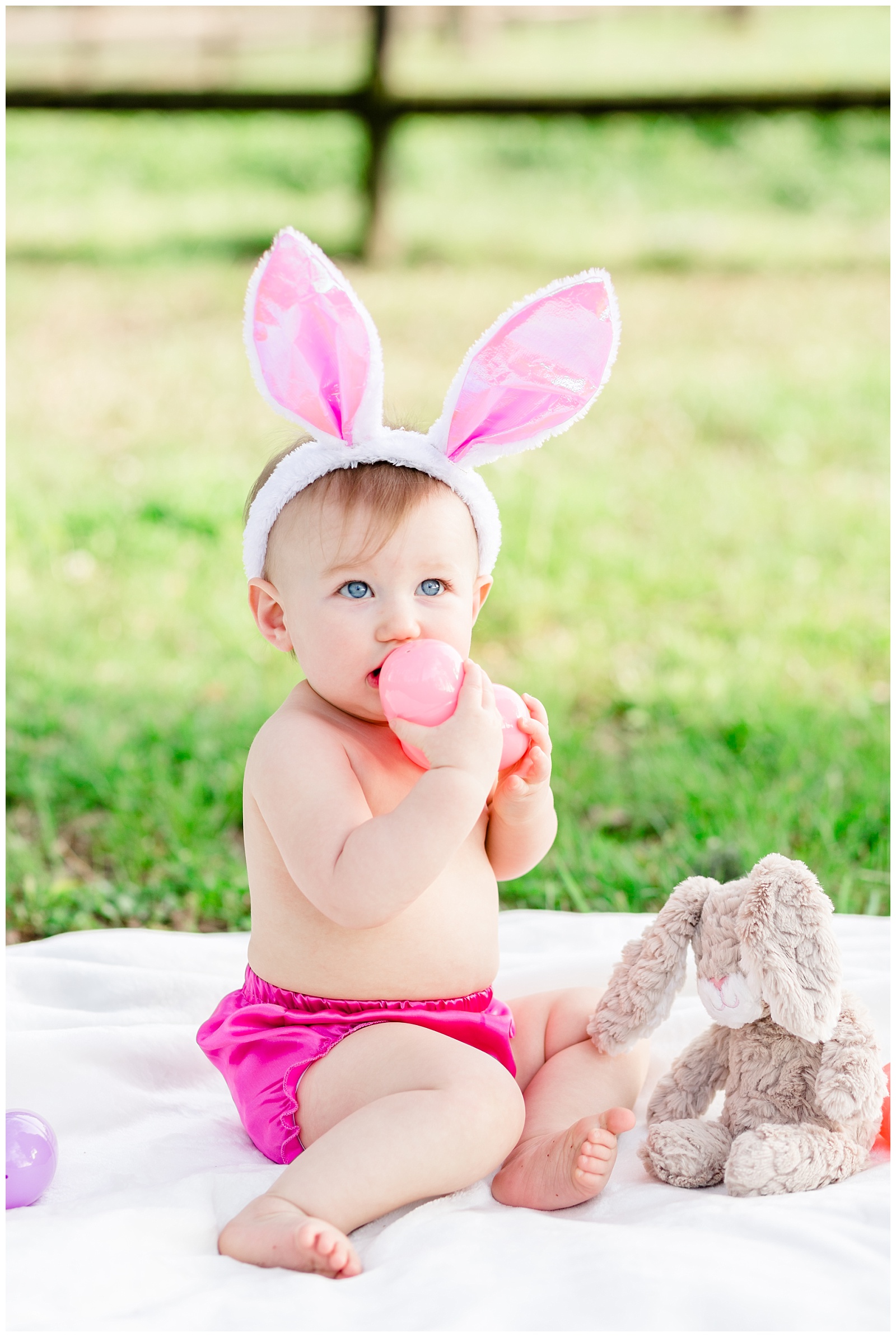 Easter Spring One Year Old Birthday Session for Baby Girl with Different Shades of Pink, Easter Eggs and Bunny Ears