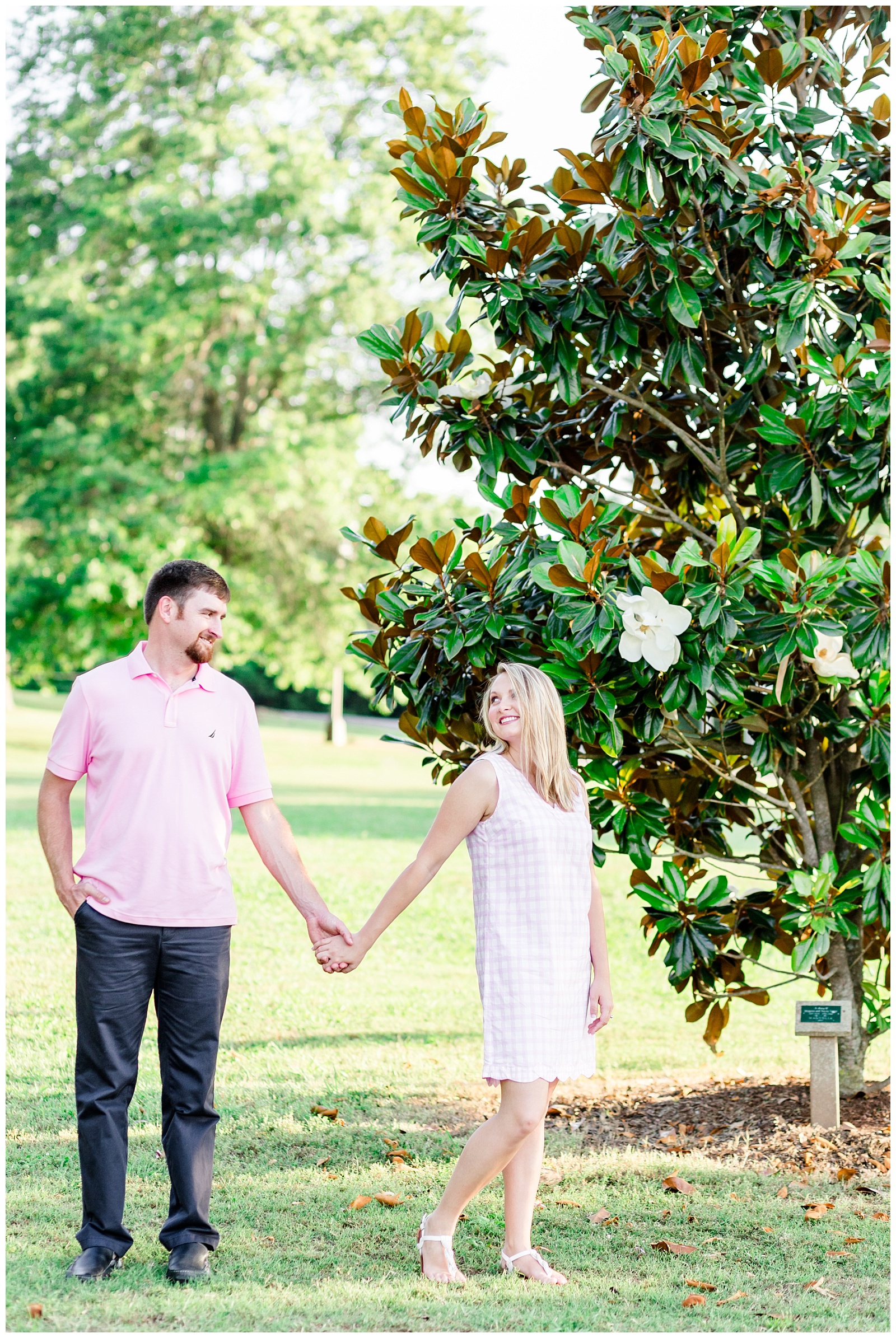 spring lake engagement session in pastel pink outfits