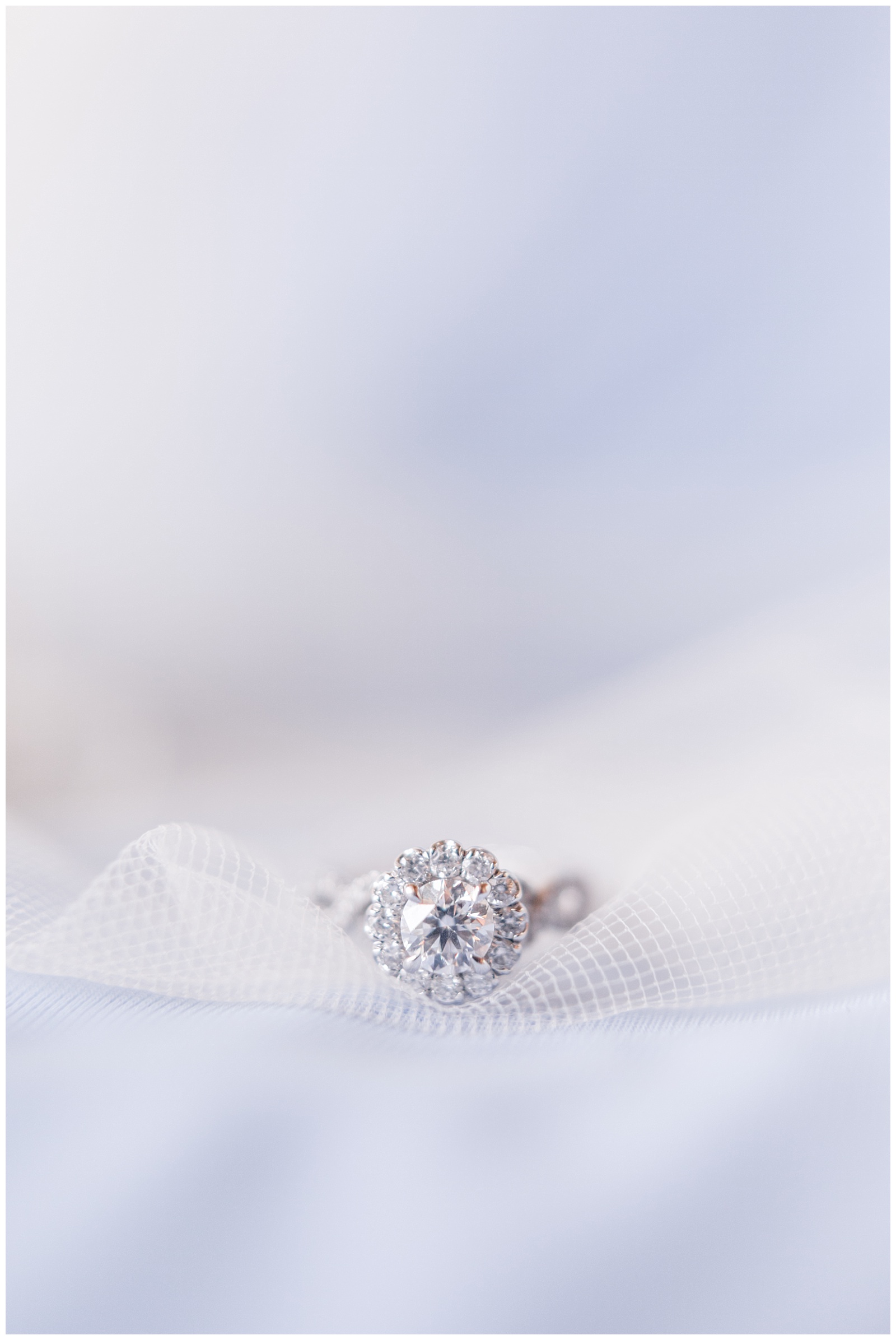 light blue wedding details with silver diamond right and veil