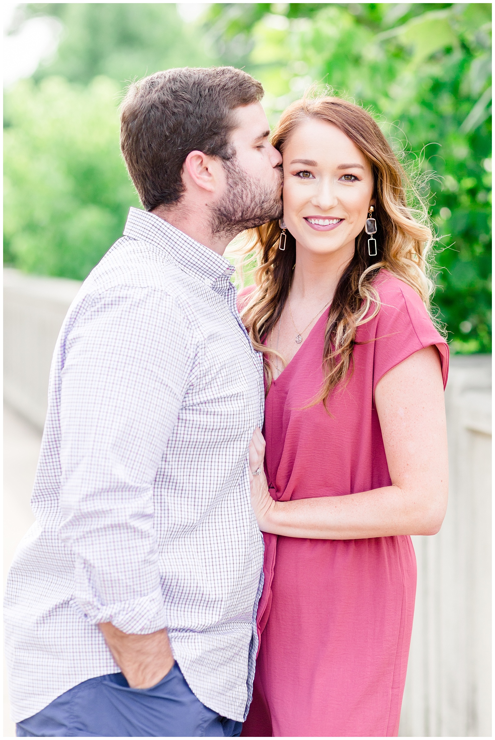Downtown summer engagement session with dog in a red jumpsuit