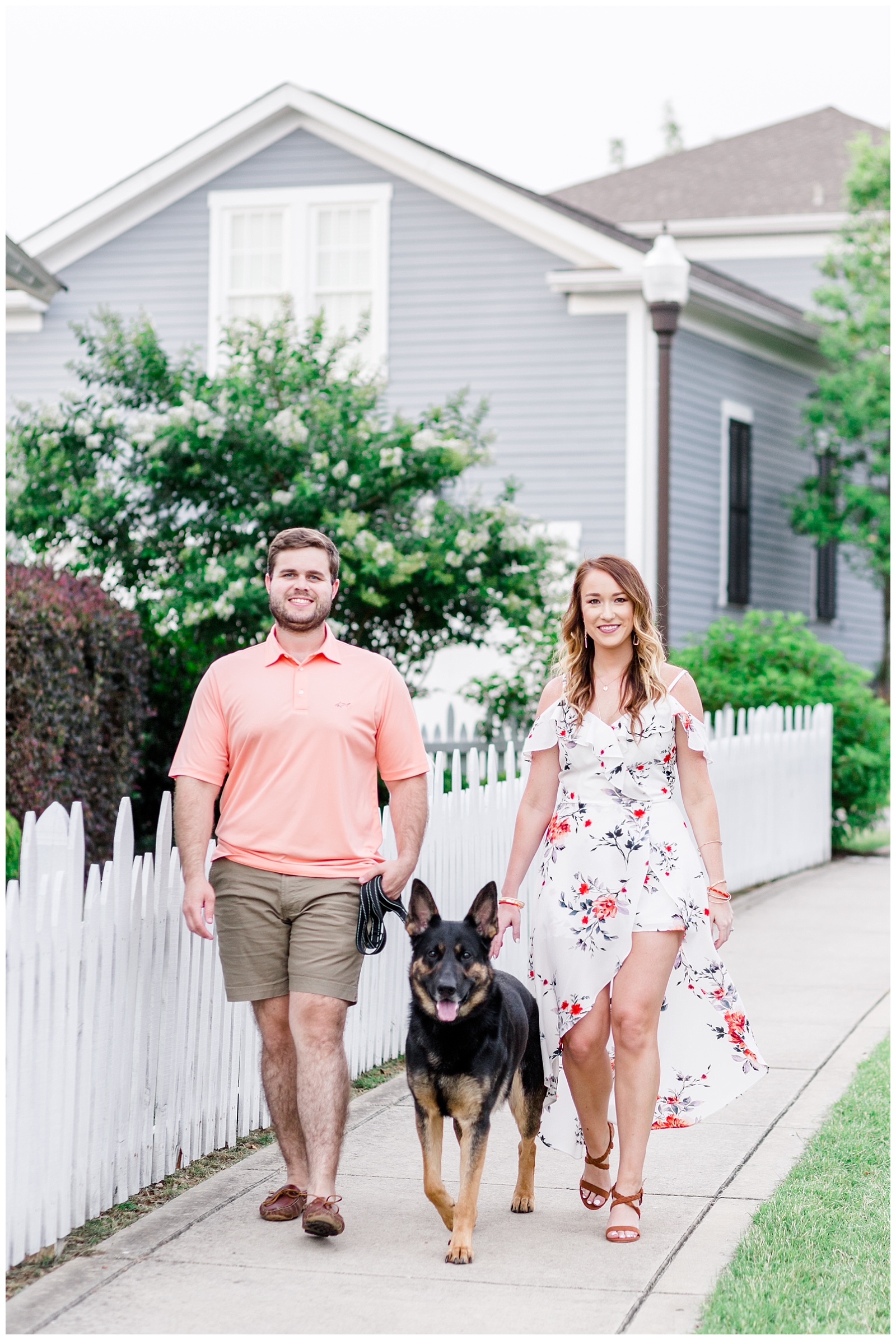 Downtown summer engagement session with dog in a white floral dress