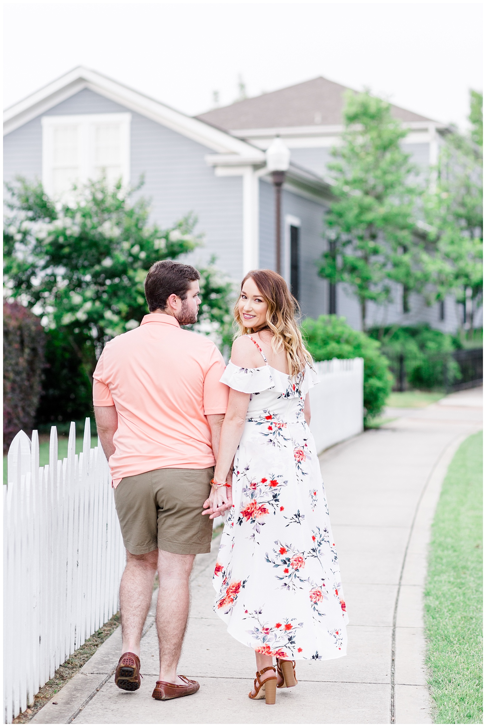 Downtown summer engagement session with dog in a white floral dress