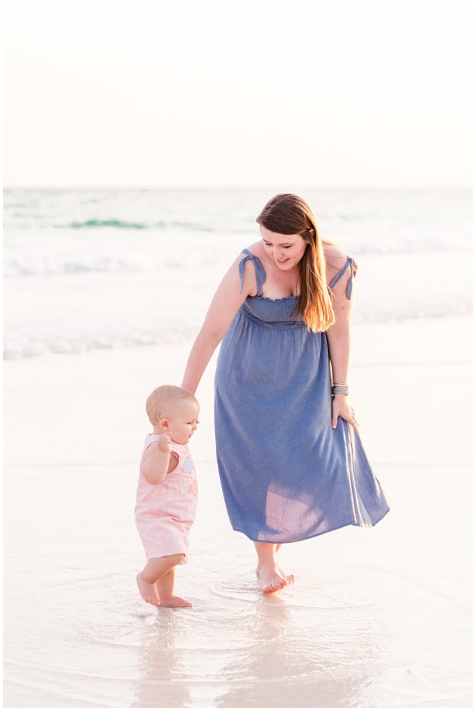 santa rosa beach family session in 30a florida in blue and coral outfits