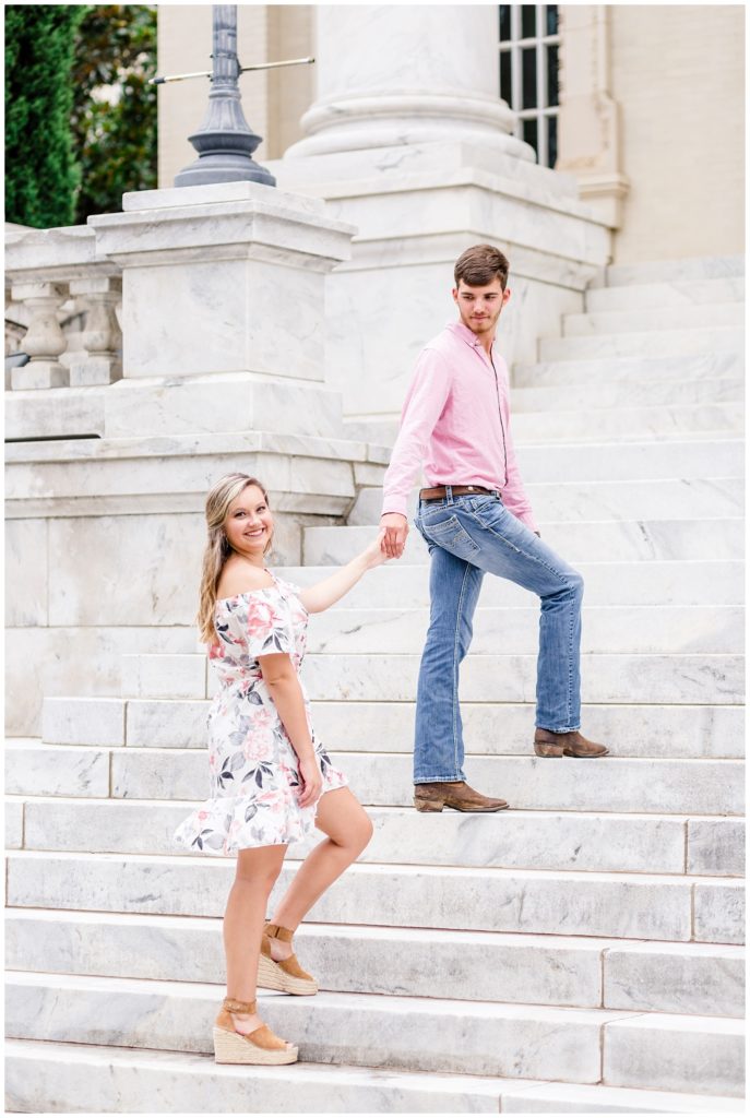 downtown birmingham engagement session photo at church in a white floral dress and pink shirt