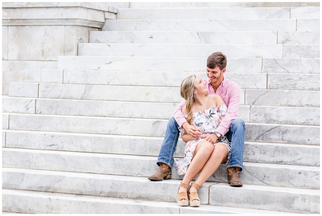 downtown birmingham engagement session photo at church in a white floral dress and pink shirt