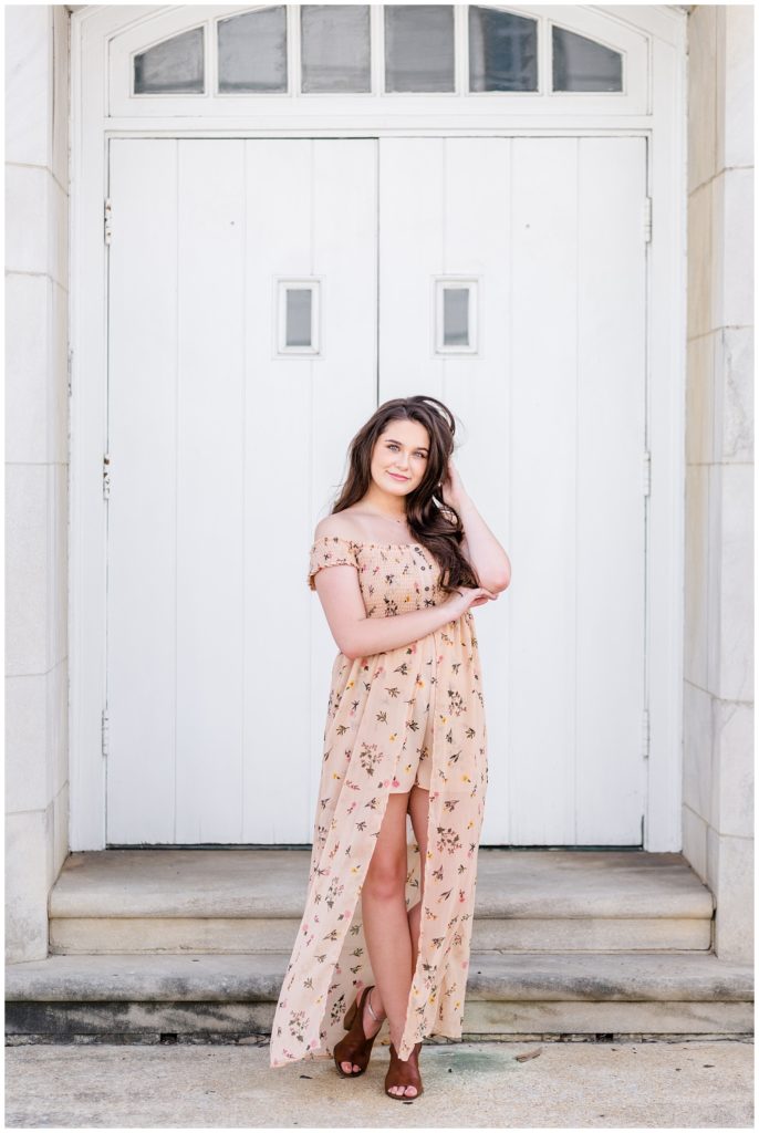 downtown senior session photo in pink maxi dress and floppy hat