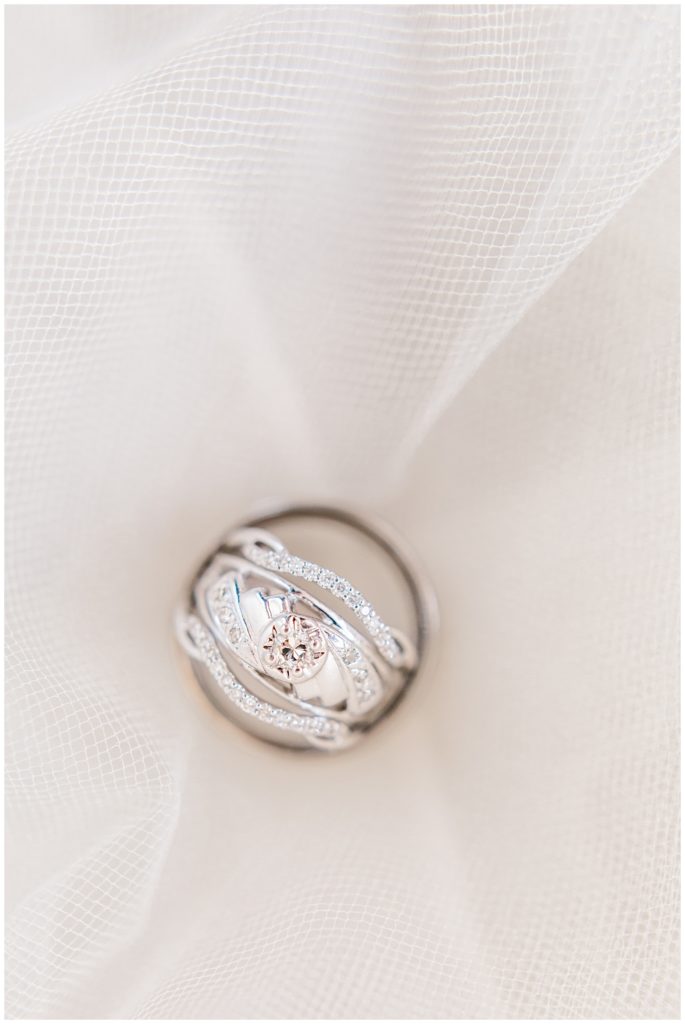 set of wedding rings on veil