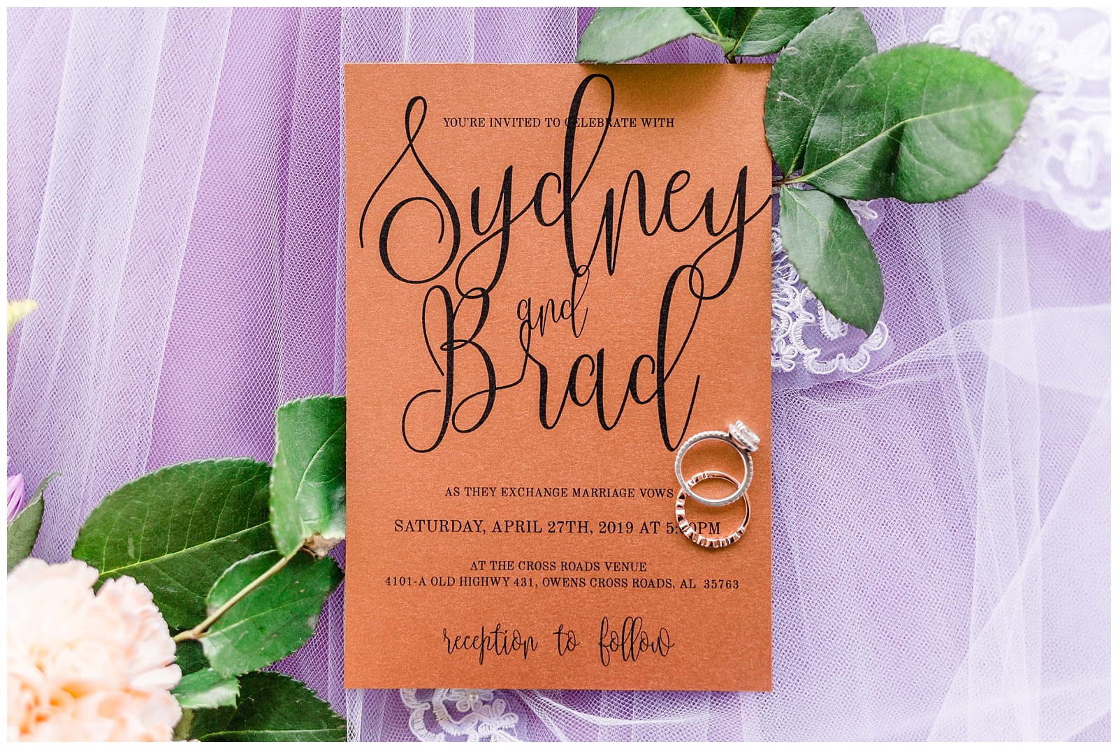 gold and purple wedding details decor and invitations