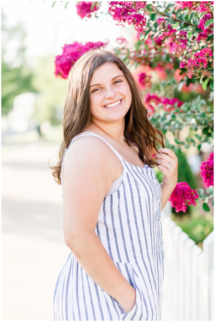 summer downtown senior session by crepe myrtles in blue striped jumpsuit