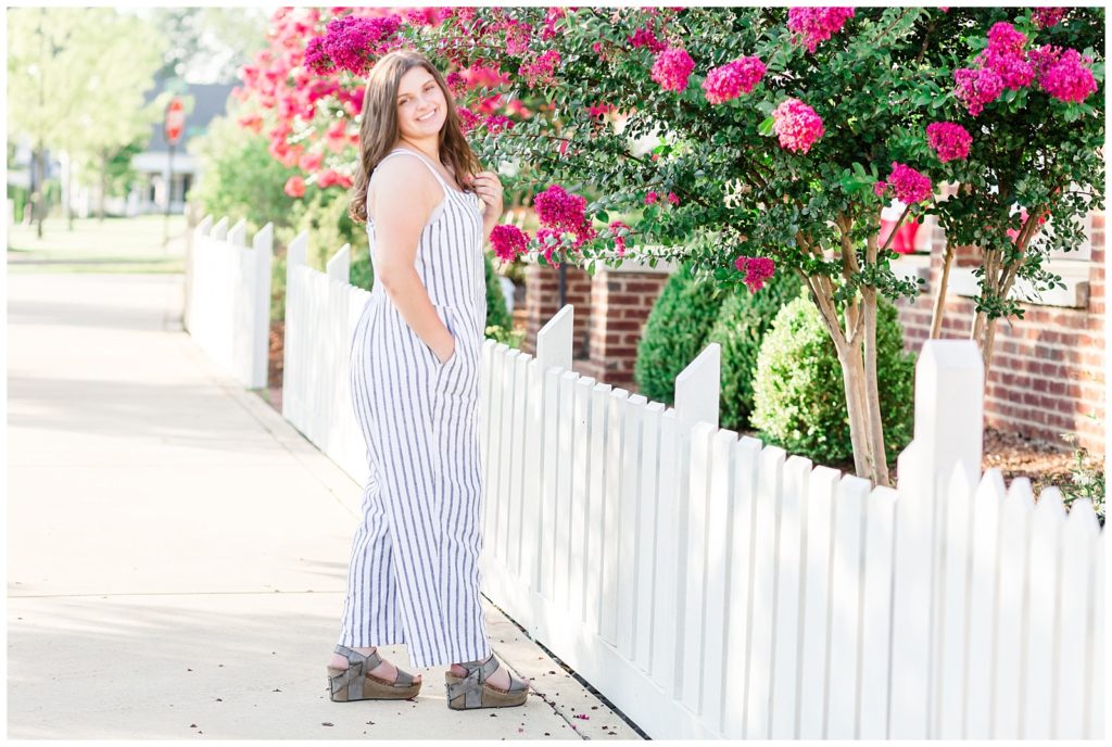 summer downtown senior session by crepe myrtles in blue striped jumpsuit