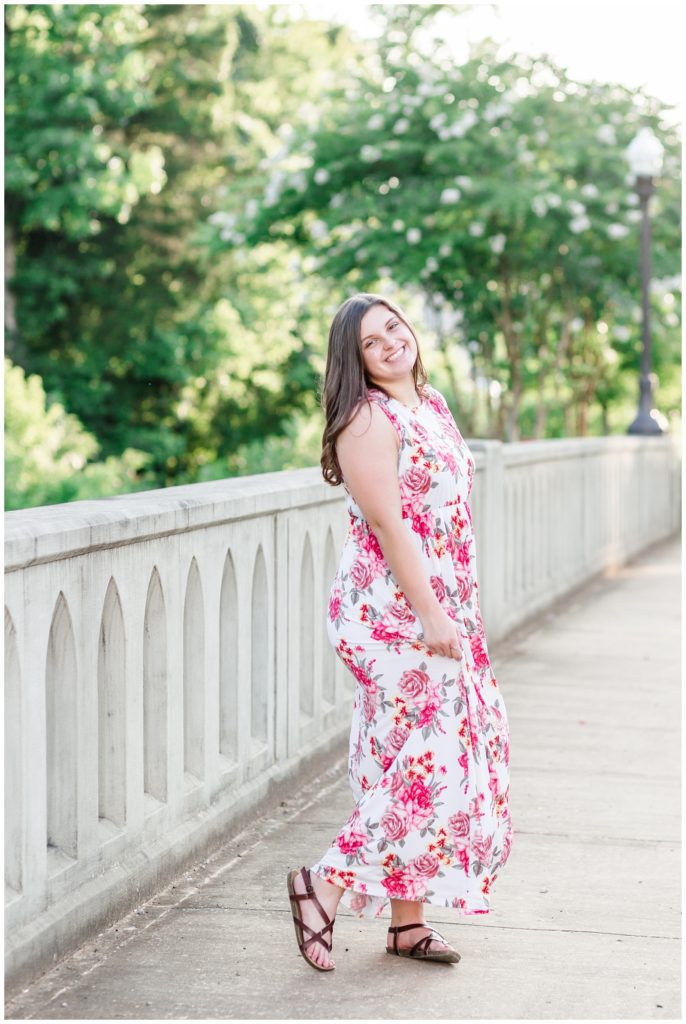 summer downtown senior session in pink floral dress