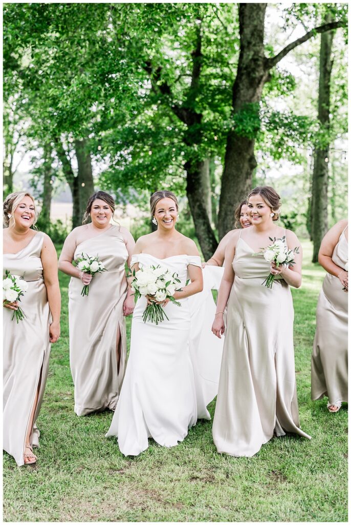 bridesmaids in champagne dresses