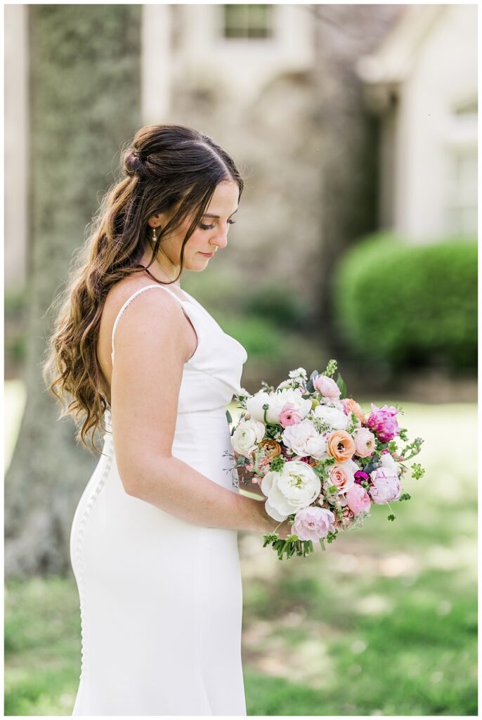 colorful pink bouquet and bride at infinity event venue