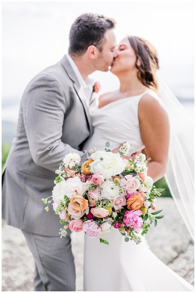 pink peony and ranunculus wedding bouquet