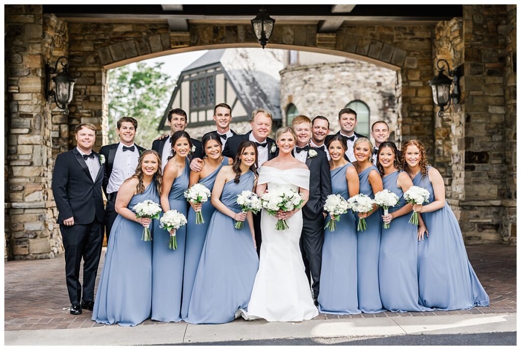 bridal party in blue at the ledges clubhouse huntsville