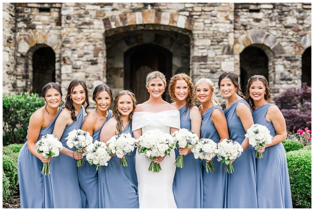 bride with bridesmaids at the ledges