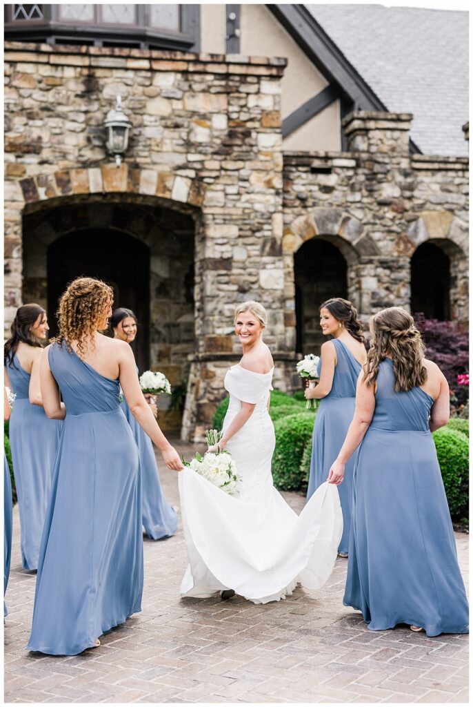 bridesmaids walking with bride at the ledges club in huntsville alabama