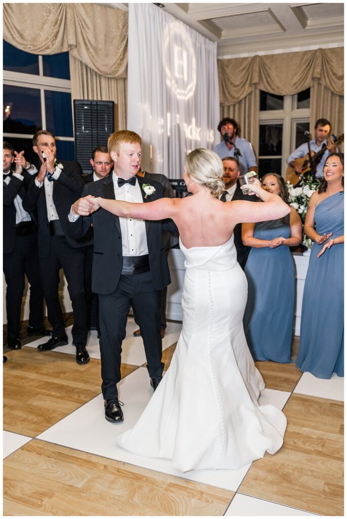 bride and groom dancing at reception at the ledges clubhouse