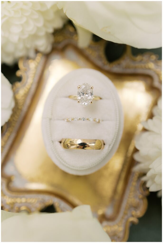 gold engagement ring and wedding bands