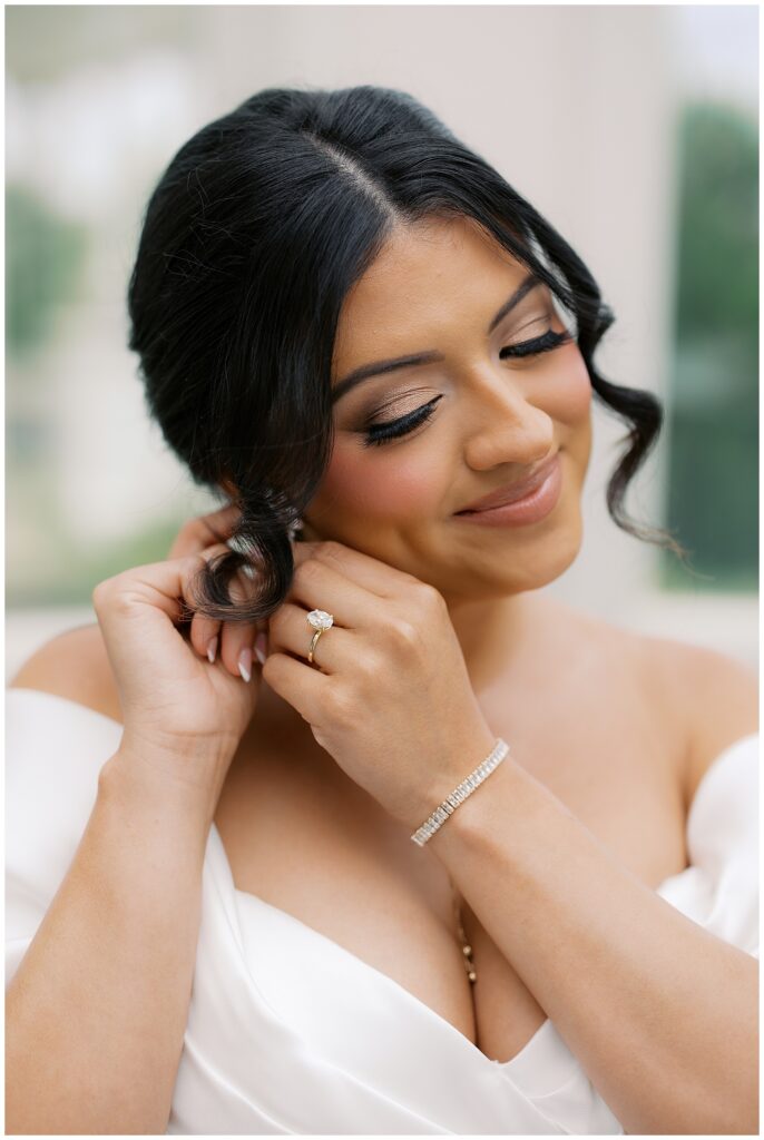 bride getting ready hair and makeup with brown eyeshadow