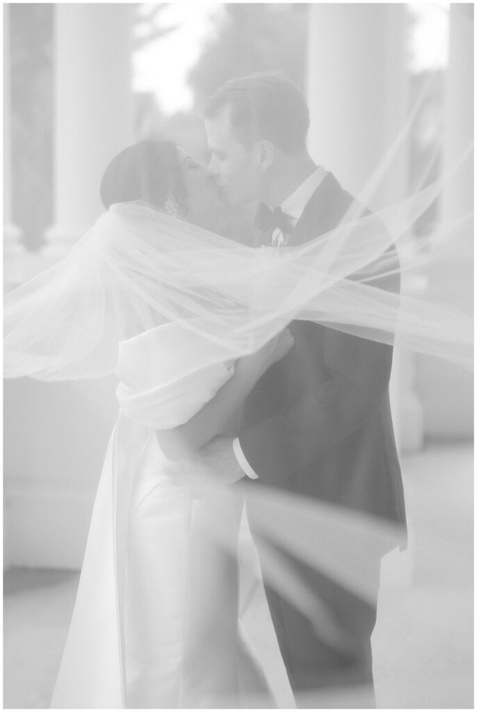 bride and groom veil photo