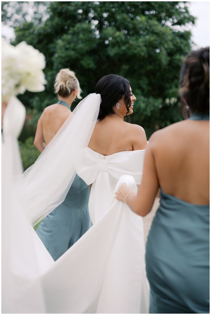 bridesmaids walking photo