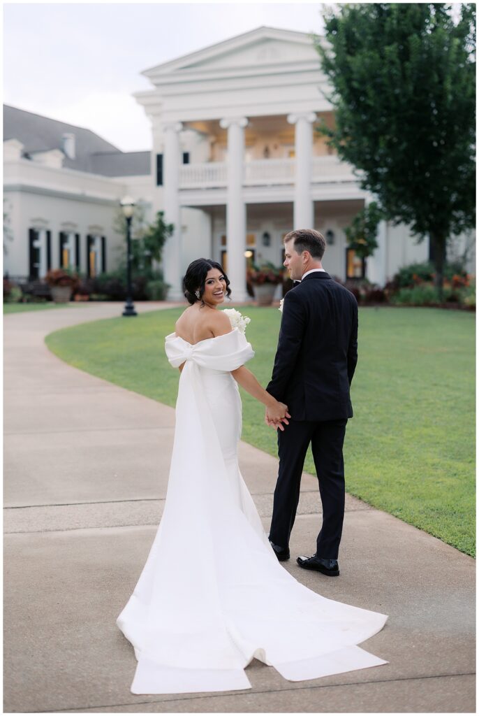 bride and groom at huntsville botanical garden